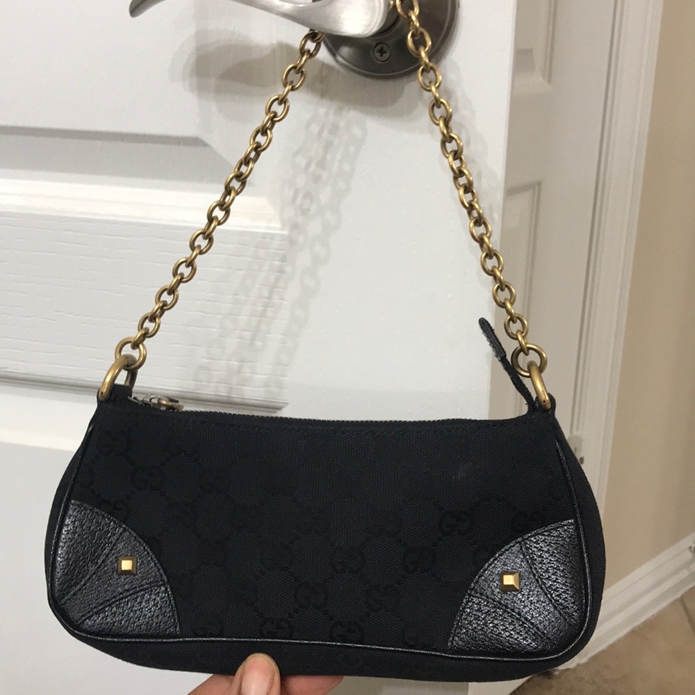 Like new 💯 Authentic Gucci Black canvas Baguette